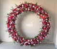 Toile de fond ronde fleurie avec cadre